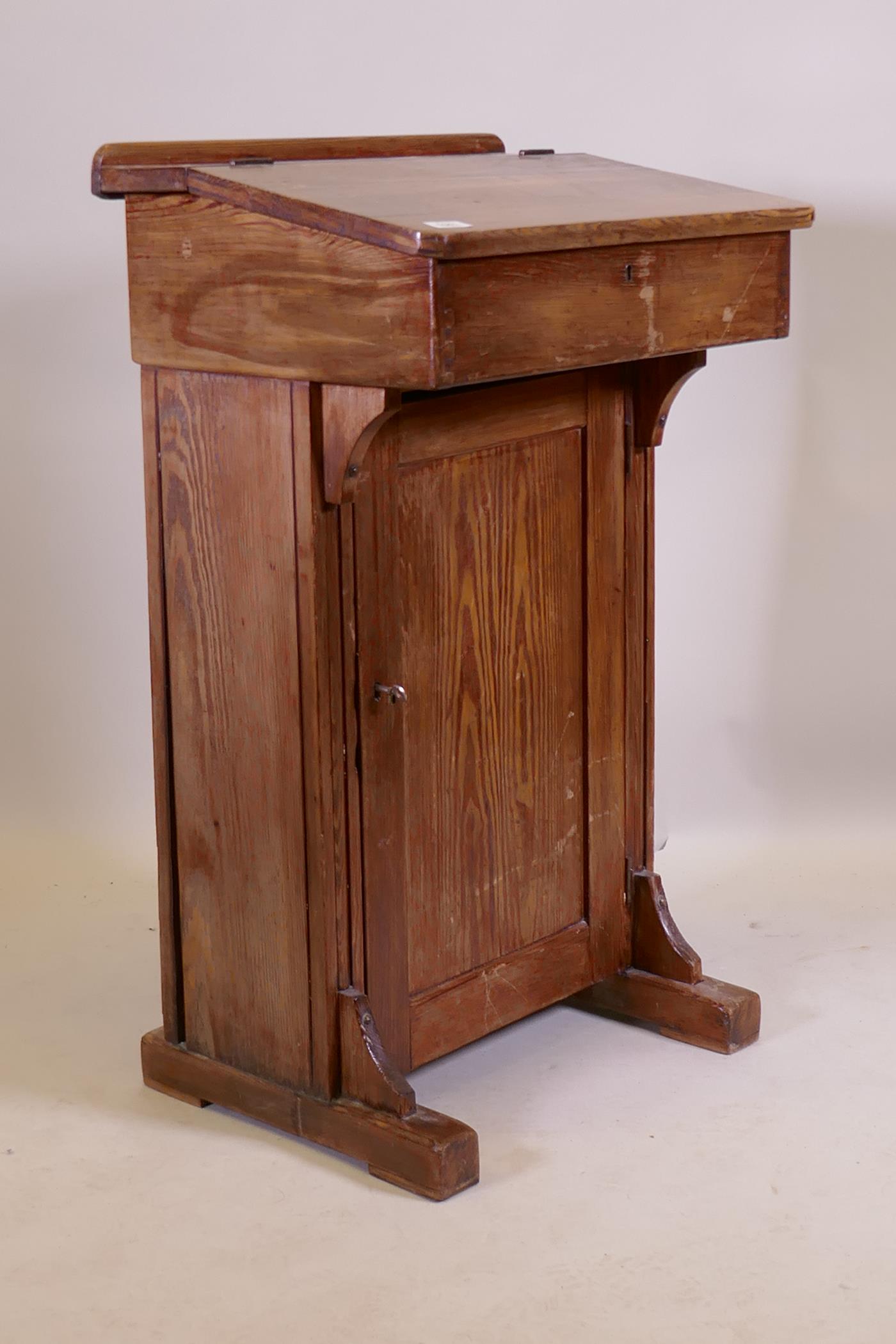 An antique pine clerk's desk, 56 x 42cm, 93cm high - Image 2 of 2
