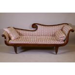 A C19th walnut chaise longue with scrolled ends, raised on tapering supports with brass castors, 200