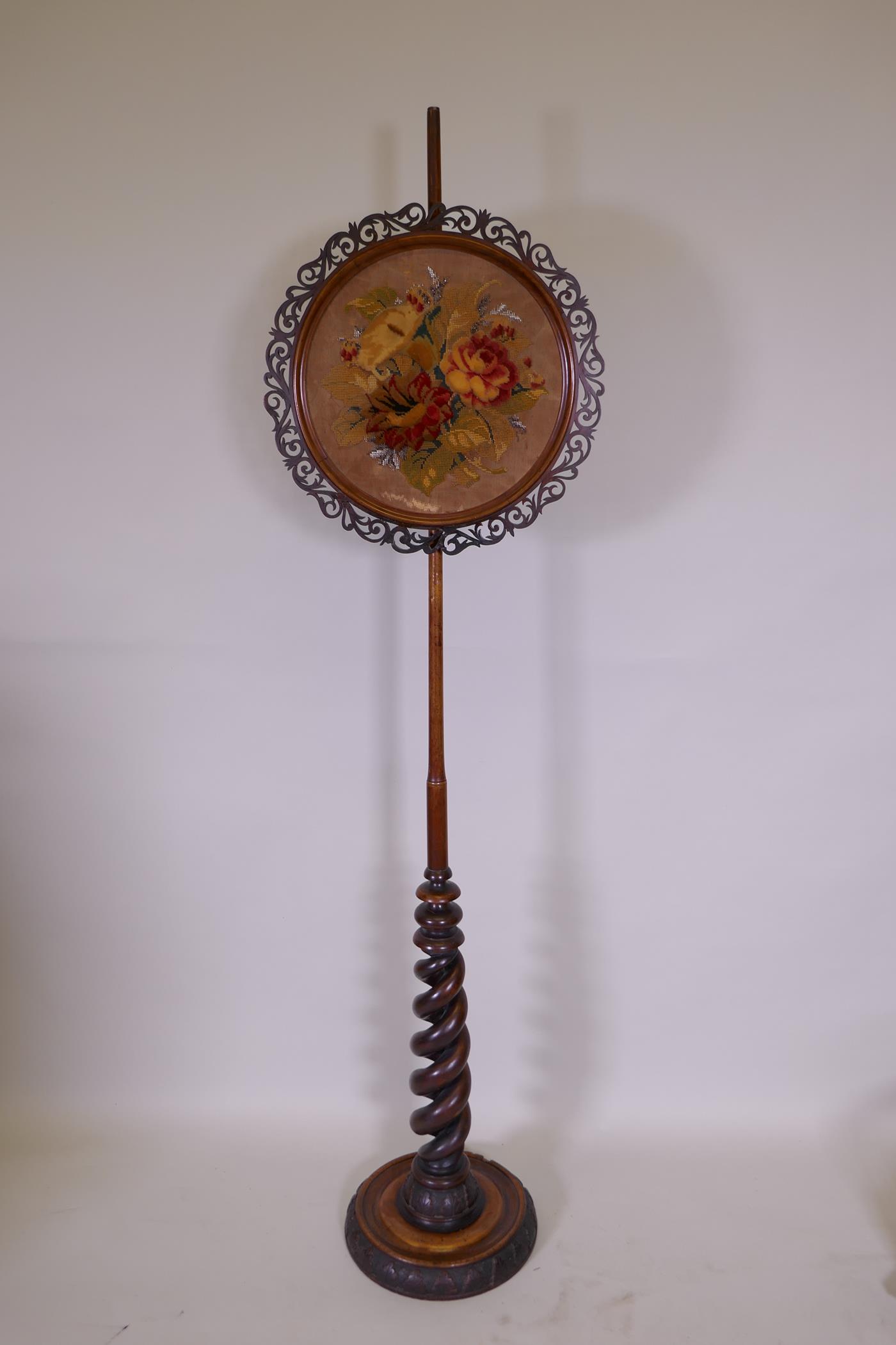 A C19th mahogany barley twist pole screen with embroidered panel, 162cm high