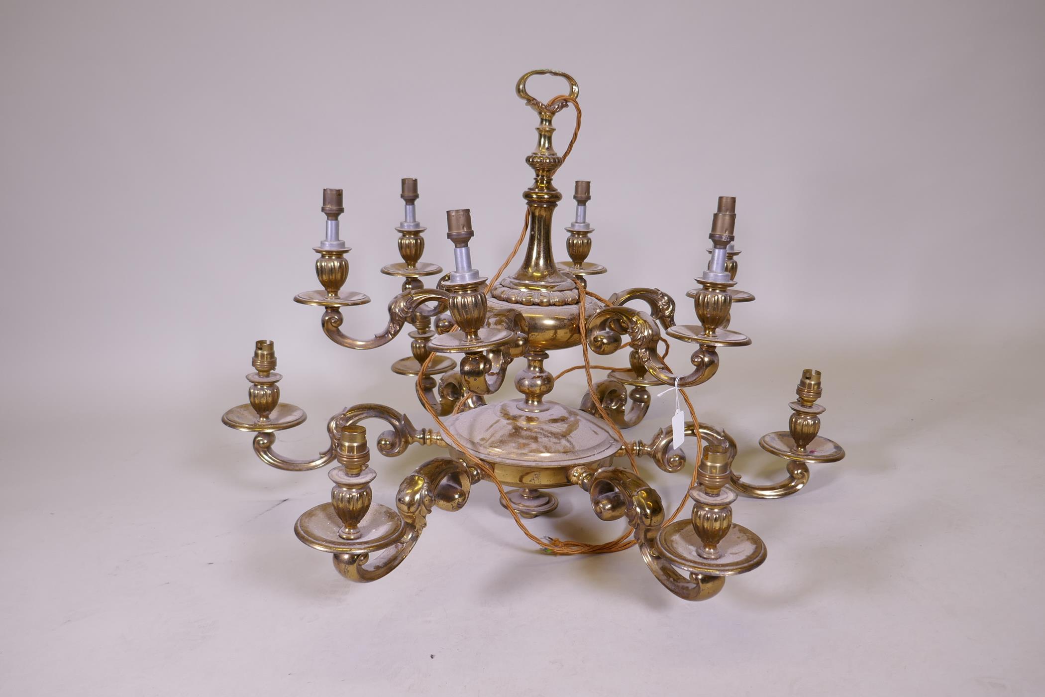 A gilt brass two tier twelve branch electrolier, 84cm diameter