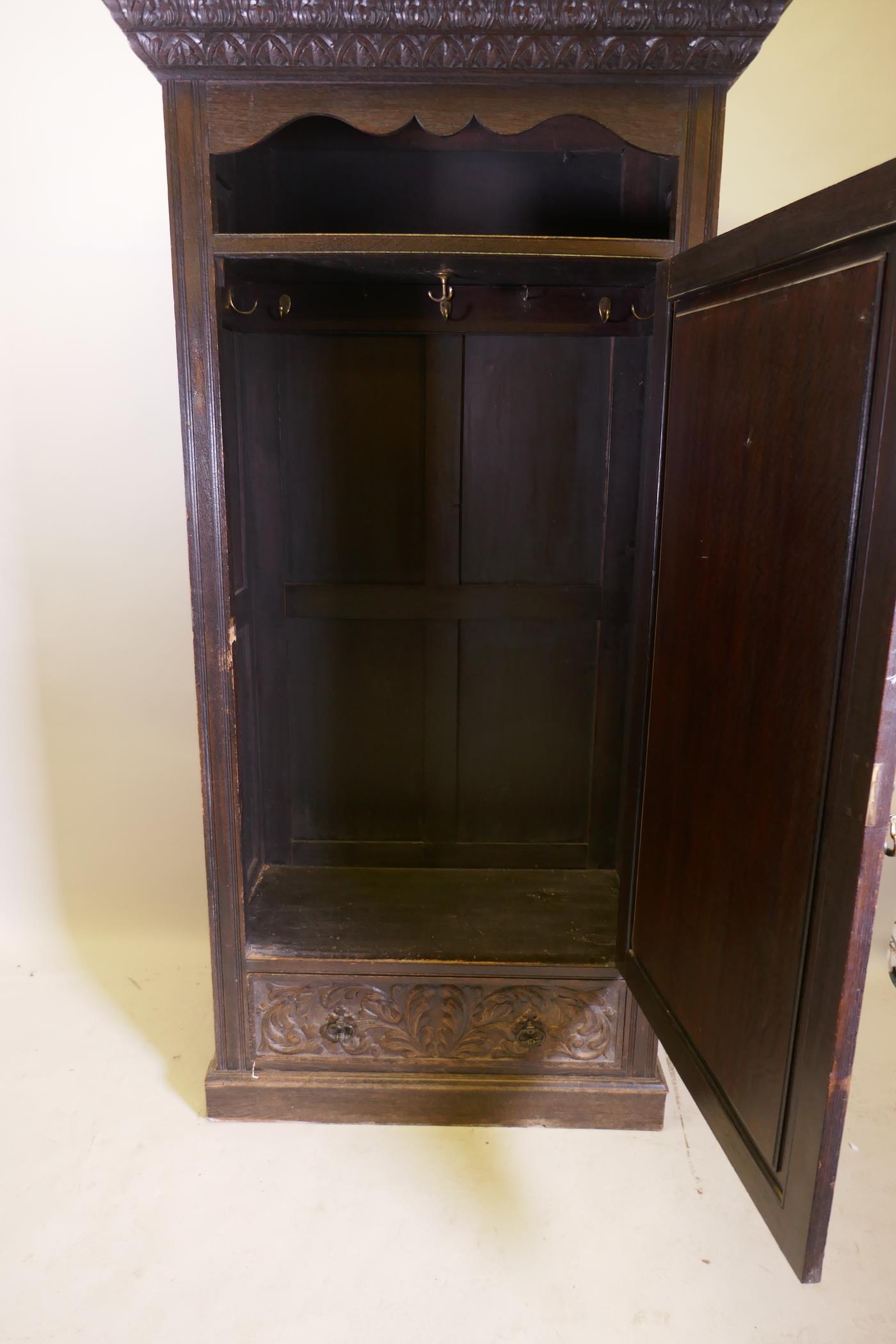 A C19th oak hall cupboard with single door over a drawer and carved decoration in the Renaissance - Image 5 of 6