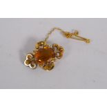 A Victorian yellow metal pendant brooch, set with a citrine, 3cm long, 3.8g