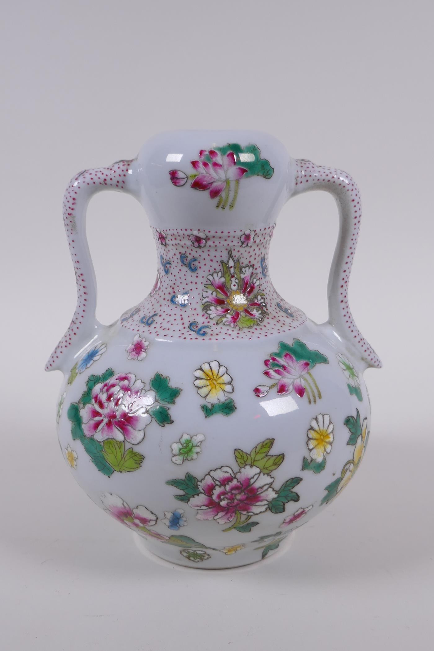 A garlic head shaped porcelain two handled vase, with famille rose enamel floral decoration, Chinese - Image 3 of 6