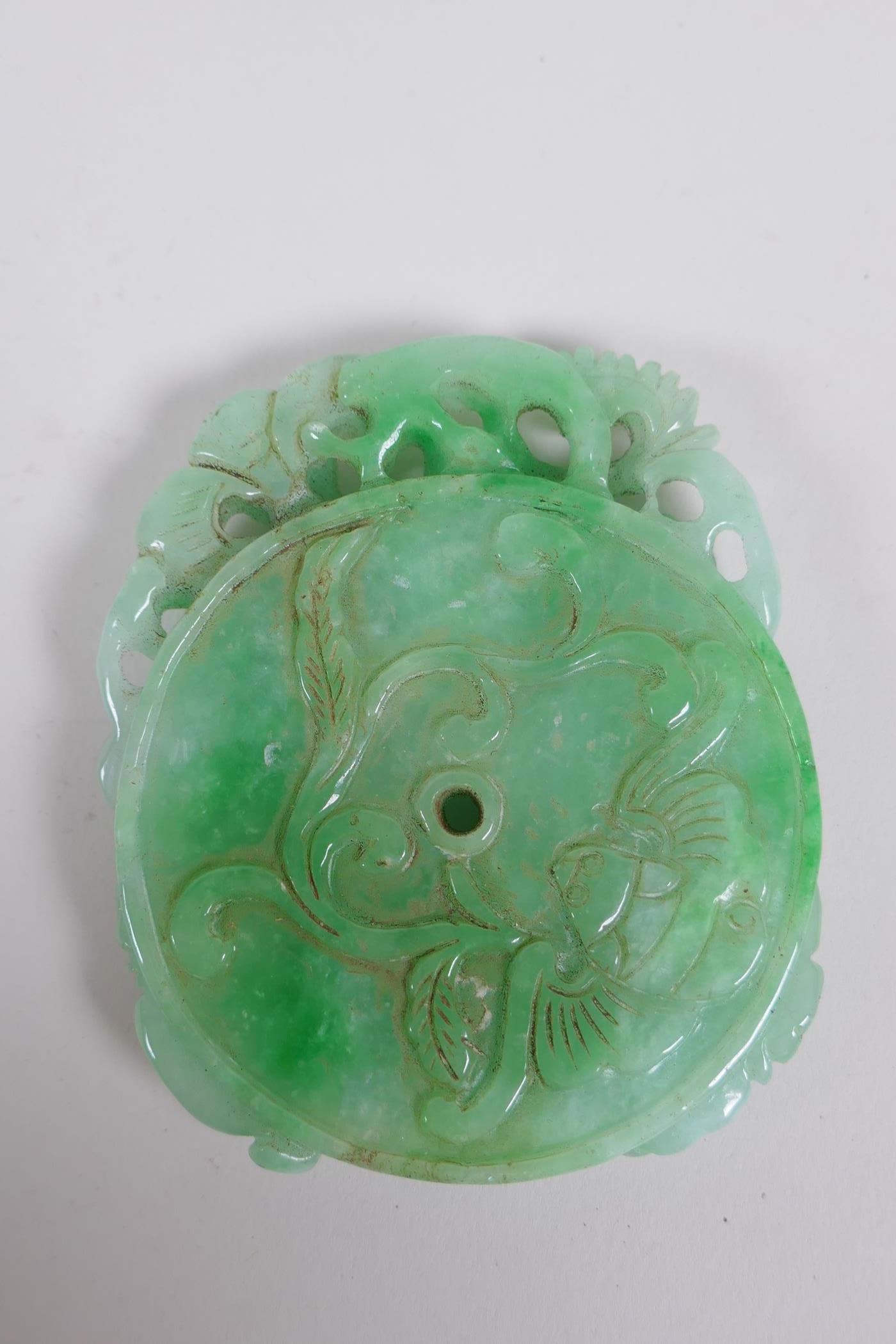 A Chinese carved mottled green jade pendant decorated with flowers, a gourd , kylin and pi disc, 7 x - Image 2 of 2