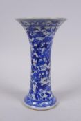 A C19th Chinese blue and white porcelain vase of waisted form, decorated with lotus flowers and