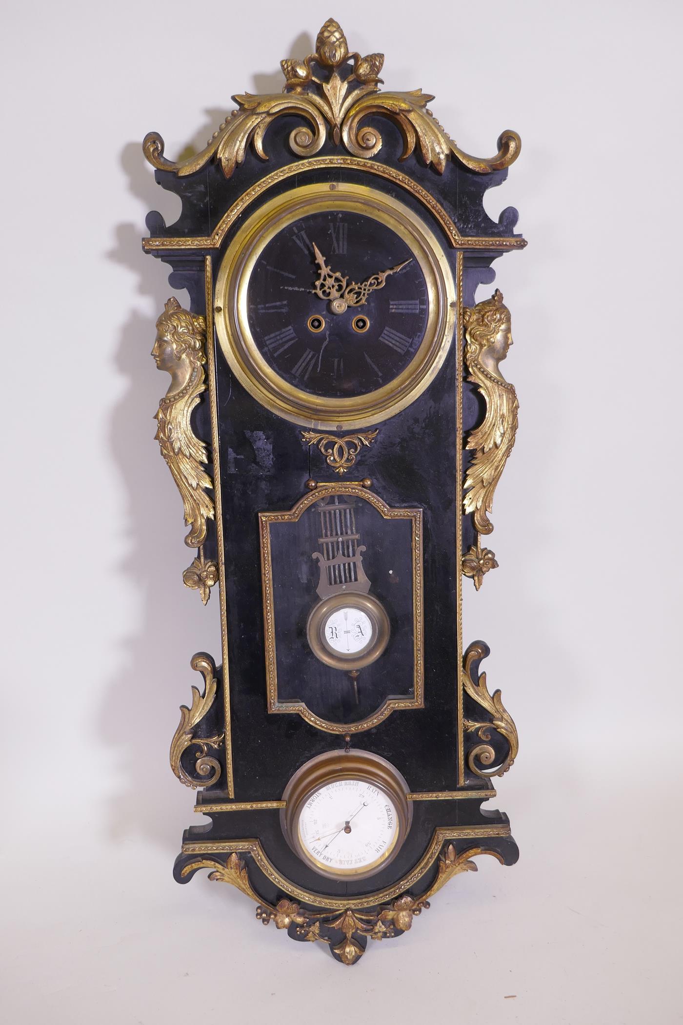 An antique ormolu and ebonised wood cased wall clock and barometer, the spring driven movement