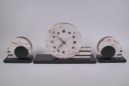 An Art Deco marble clock garniture, largest 37cm wide, 24cm high