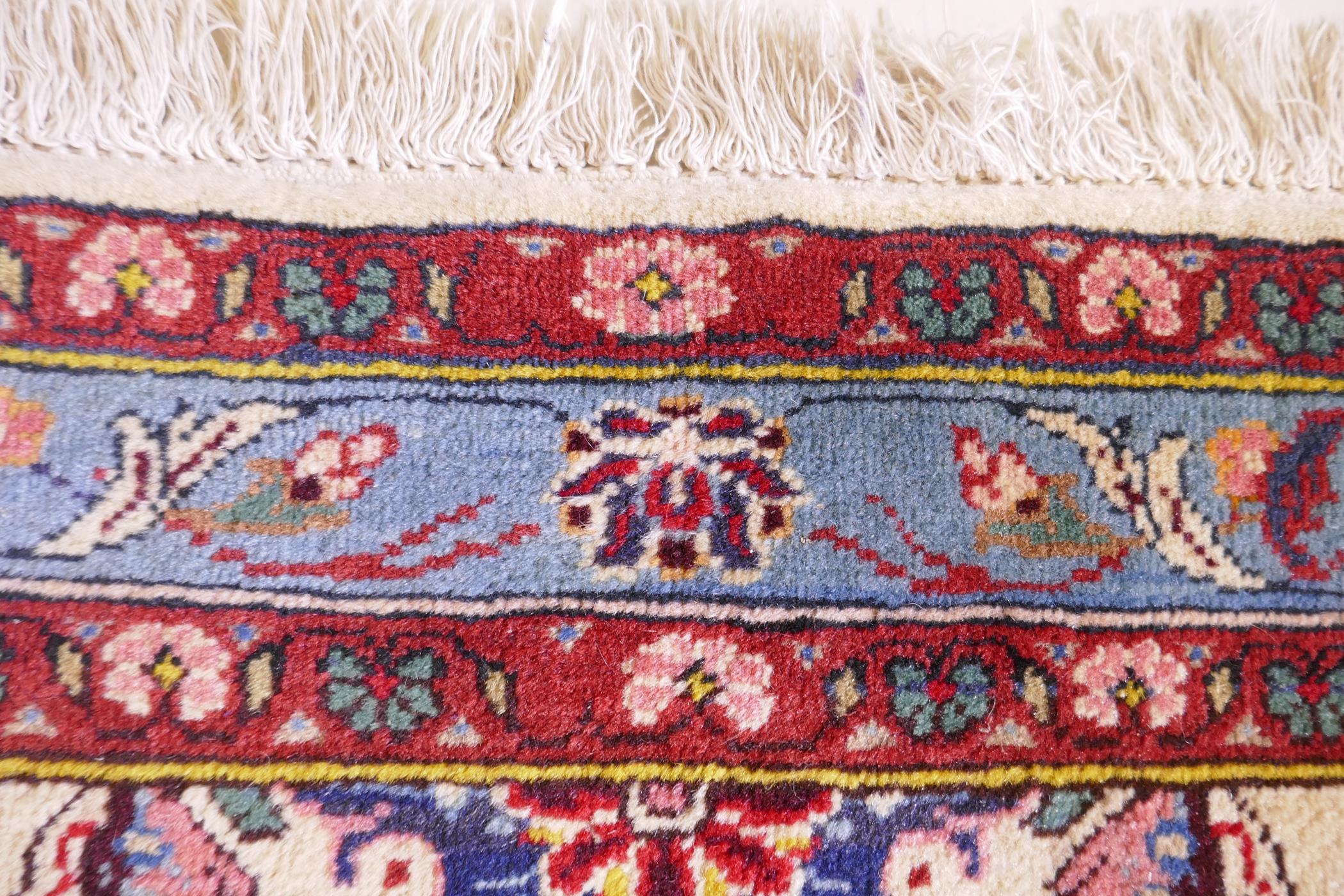 An Iranian cream ground wool rug with blue and red panelled design, 112 x 156cm - Image 5 of 5