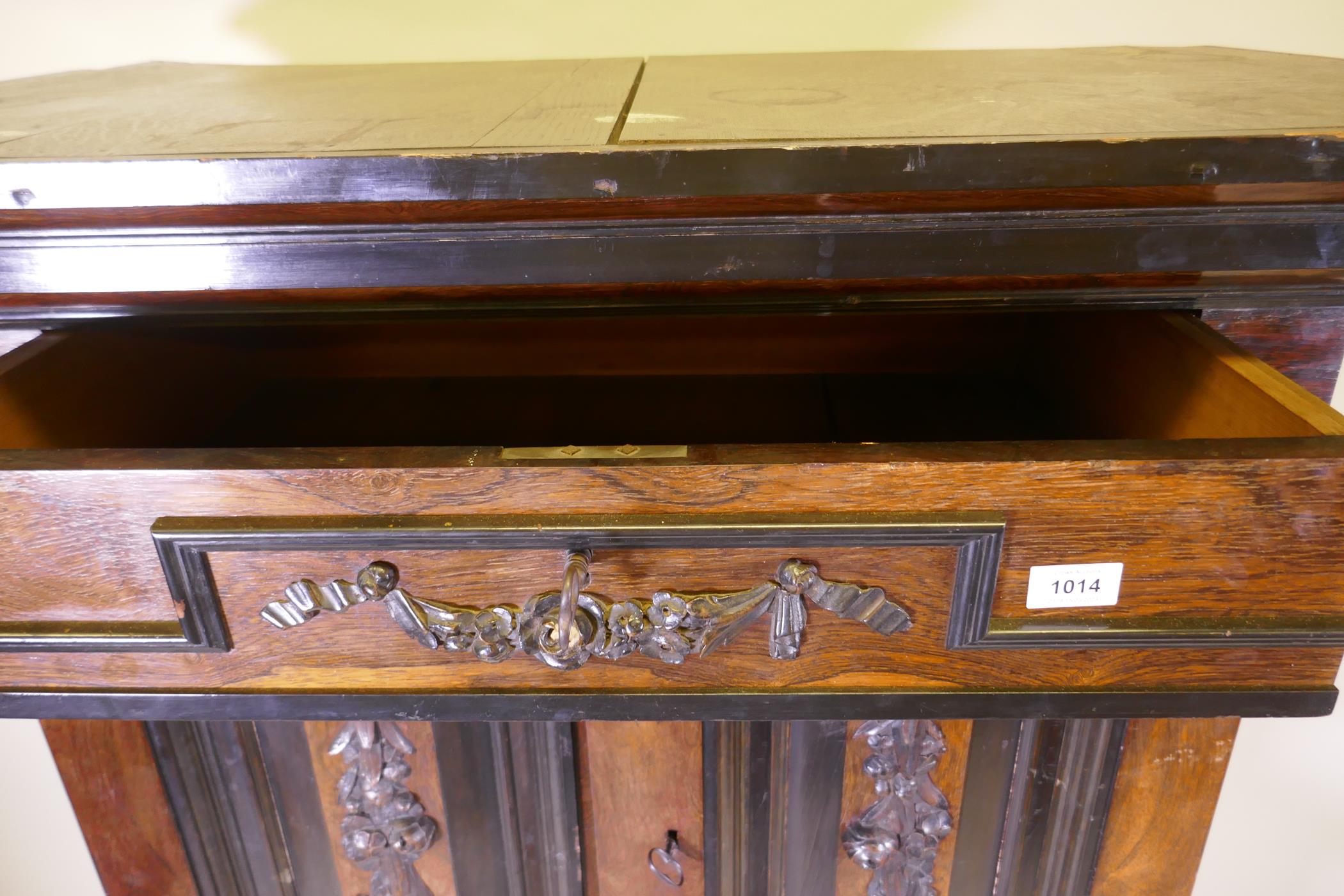 A C19th Continental rosewood cabinet on stand, with carved and ebonised detail, the upper section - Image 3 of 8