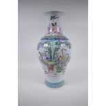 A Chinese famille rose porcelain phoenix tail vase decorated with the immortals and mythical