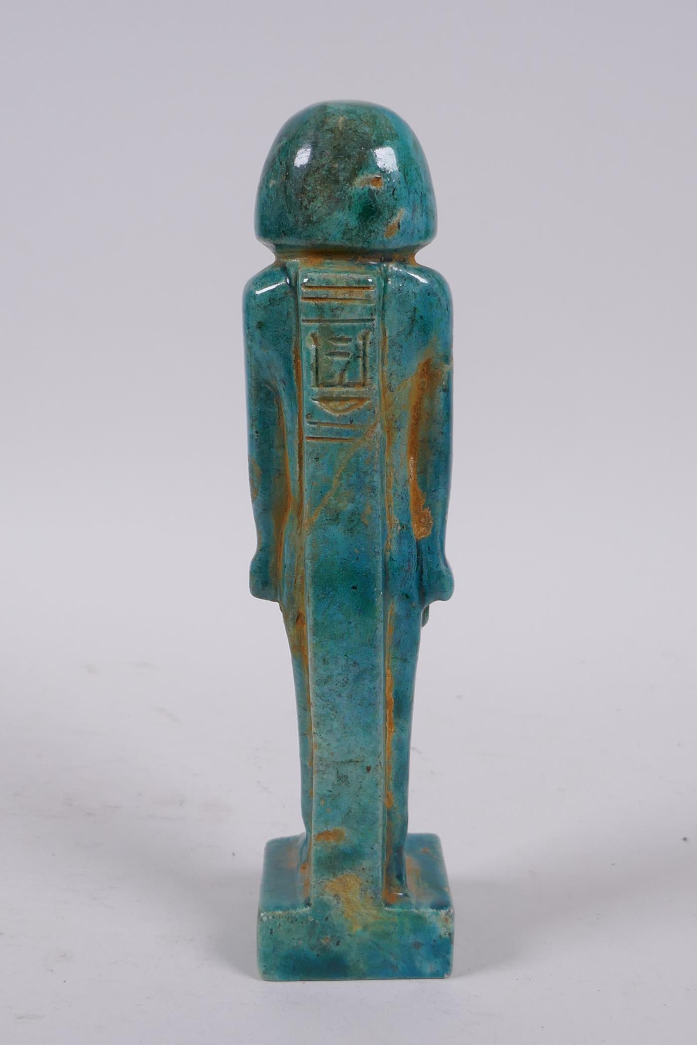 An Egyptian faience turquoise glaze shabti, 21cm high - Image 3 of 3