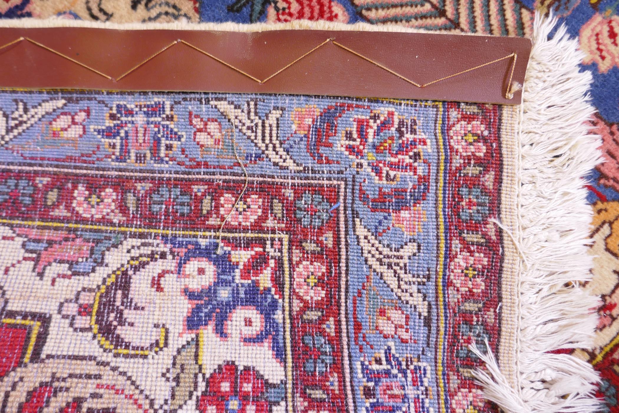 An Iranian cream ground wool rug with blue and red panelled design, 112 x 156cm - Image 4 of 5