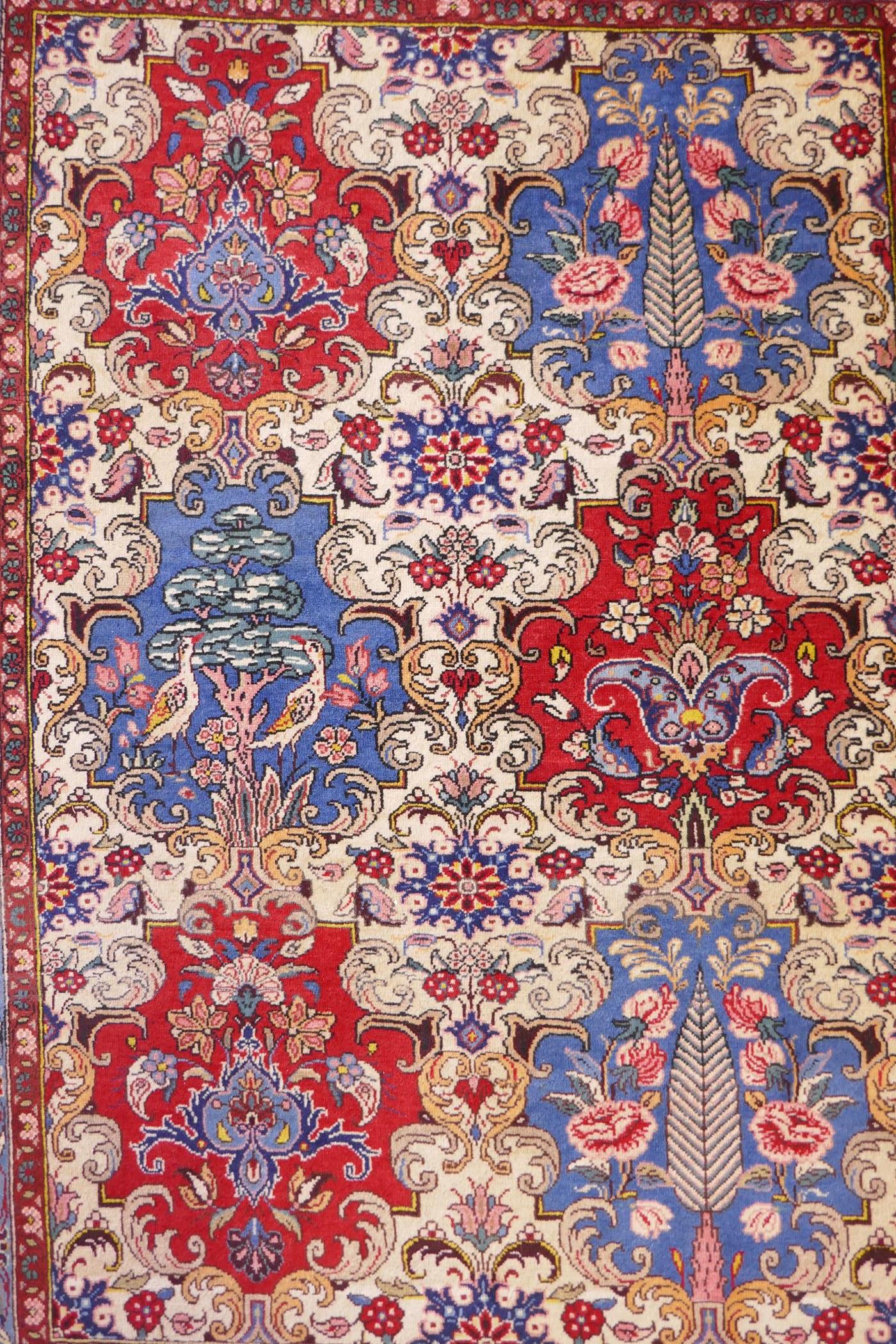 An Iranian cream ground wool rug with blue and red panelled design, 112 x 156cm - Image 2 of 5