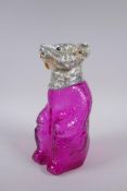 A silver plate and cranberry coloured glass bear decanter, 22cm high