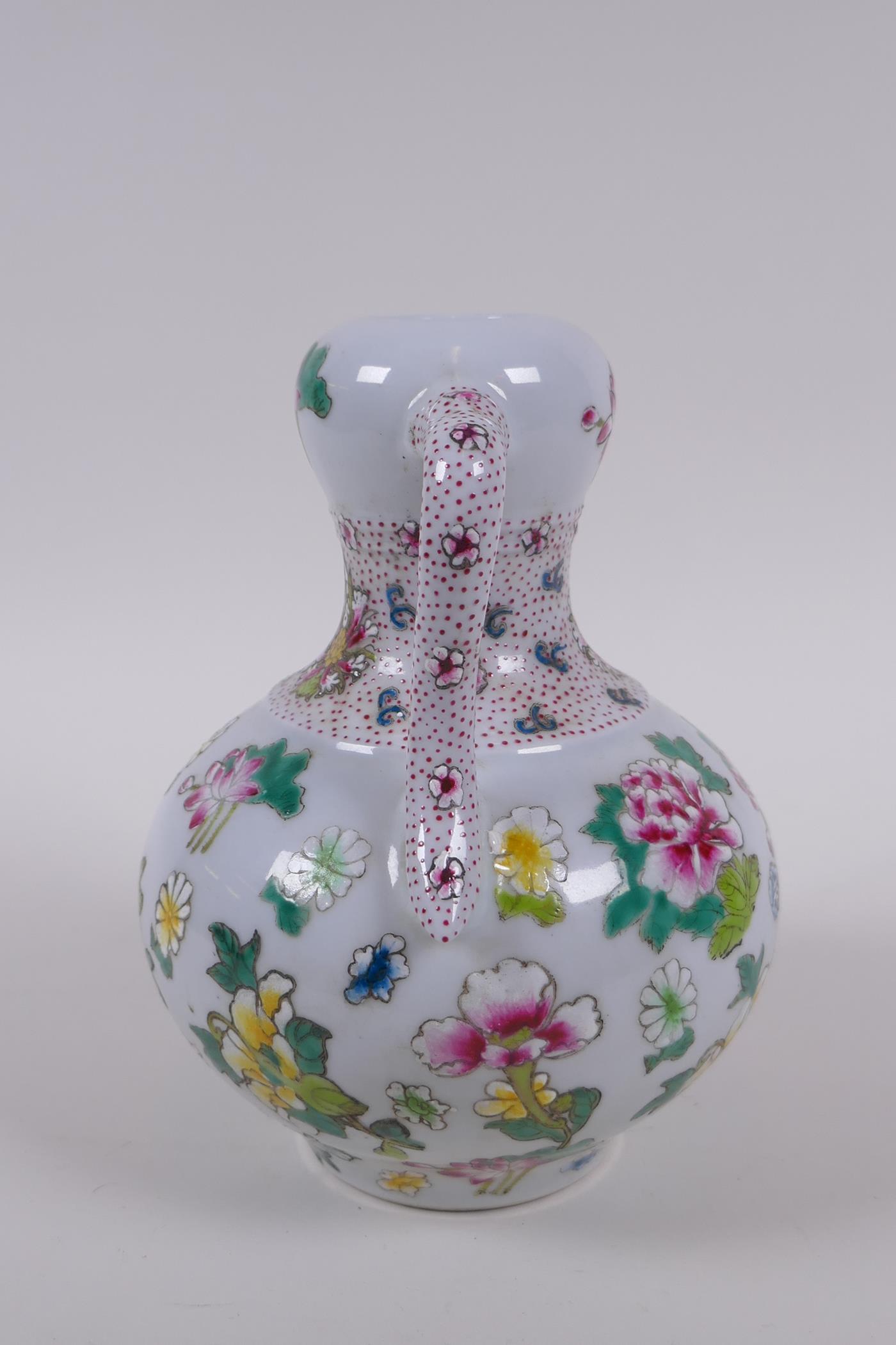 A garlic head shaped porcelain two handled vase, with famille rose enamel floral decoration, Chinese - Image 4 of 6