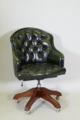 A button back leather tilt and swivel office desk chair