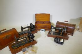 A Bradbury & Co, Wellington Works of Oldham, table top hand cranked sewing machine in walnut case, a