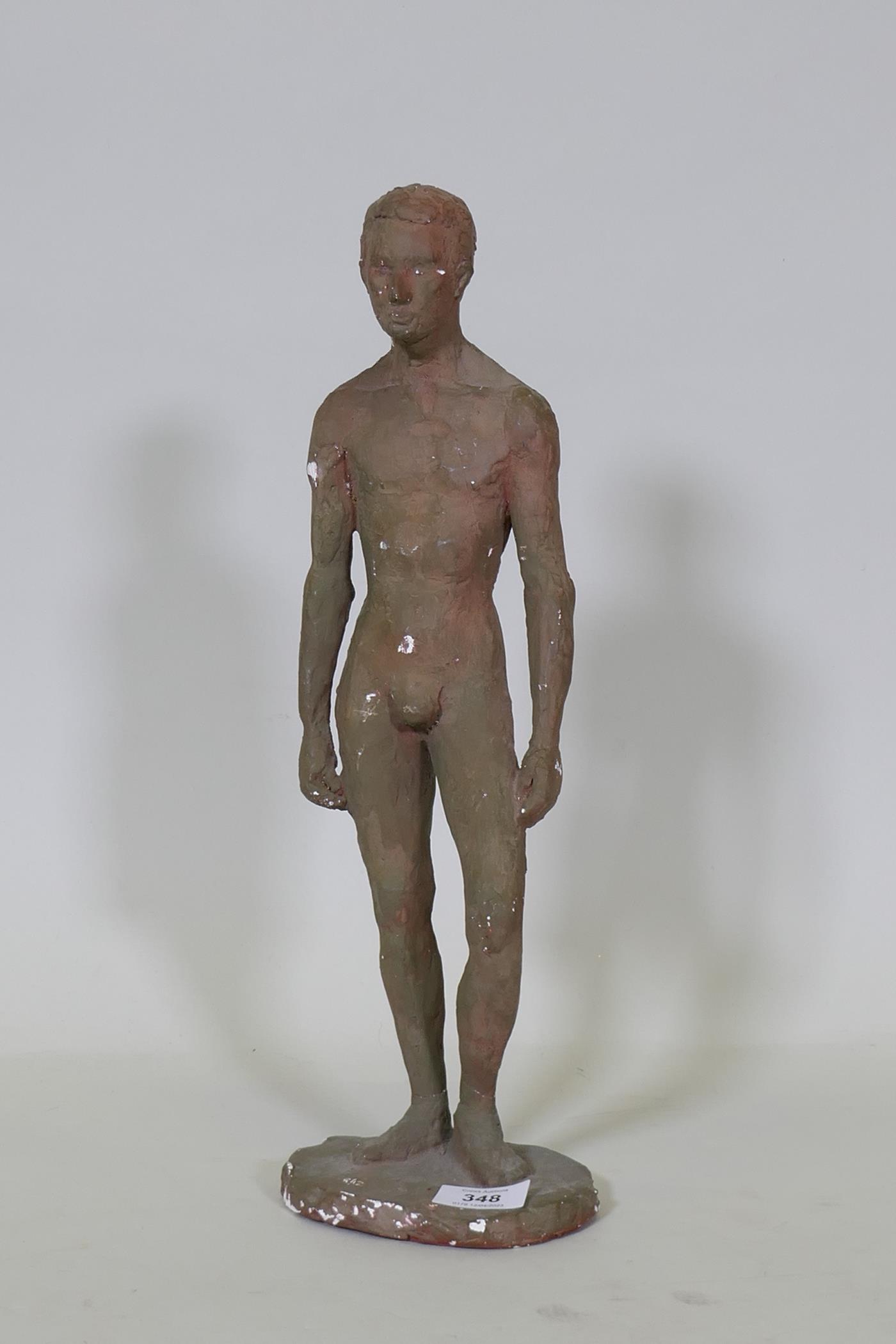 A vintage painted plaster figure of a male nude, 43cm high