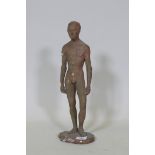 A vintage painted plaster figure of a male nude, 43cm high
