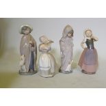 Four Nao porcelain figures, girl with a lamb, 25cm high