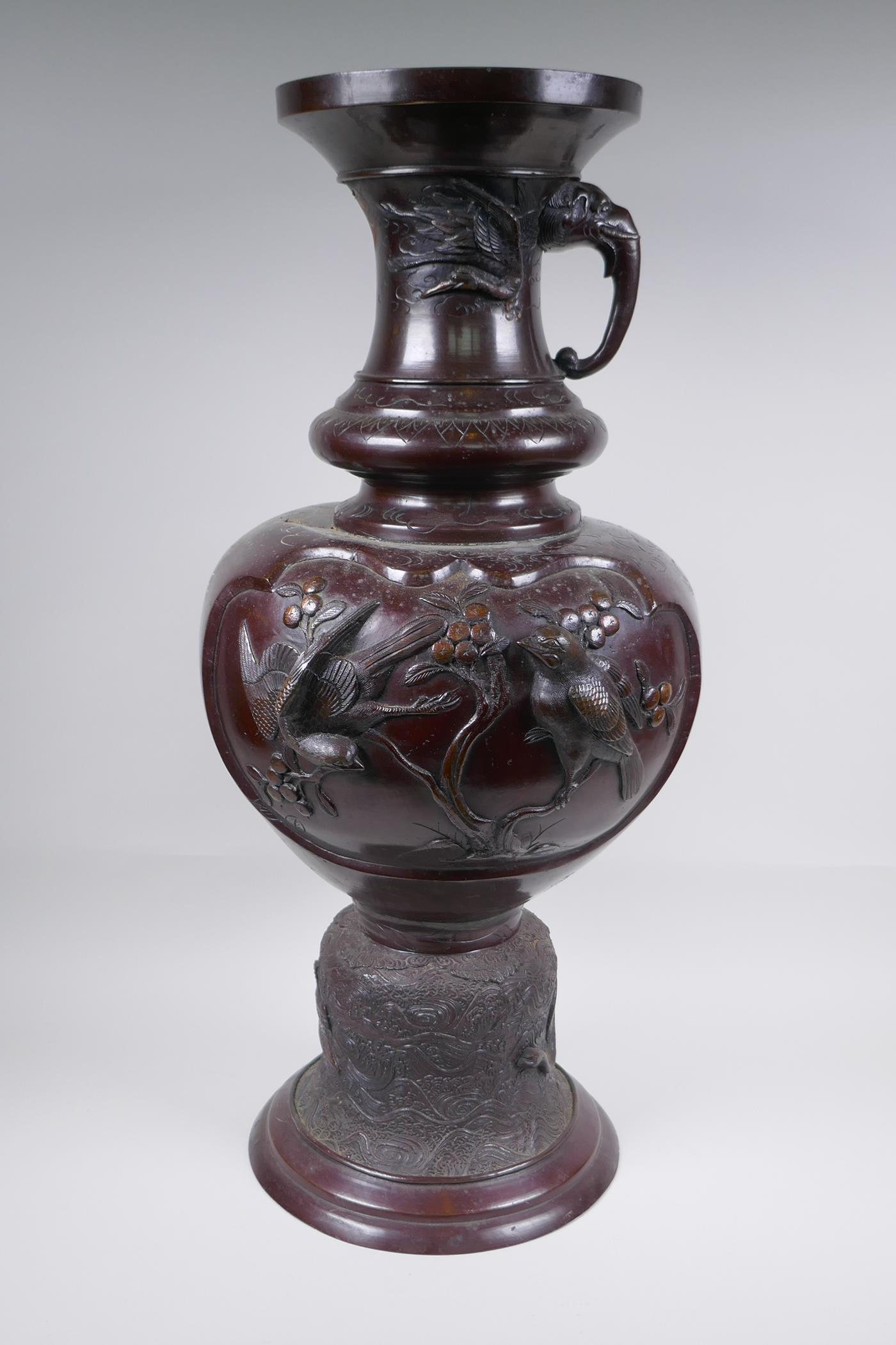 A Japanese Meiji period bronze urn with two handles and raised decorative panels depicting asiatic - Image 5 of 9