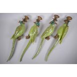 Two pairs of polychrome porcelain and gilt metal parrot sconces, 47cm long