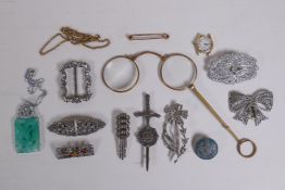 A collection of vintage silver costume jewellery, mostly brooches and pins, and a collection of