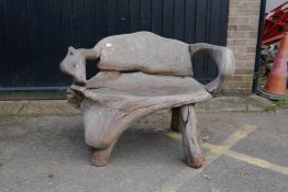 A root-wood garden bench, 120cm wide