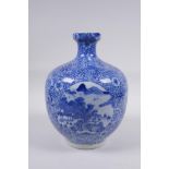A blue and white porcelain vase with decorative panels depicting landscape scenes, in decorative