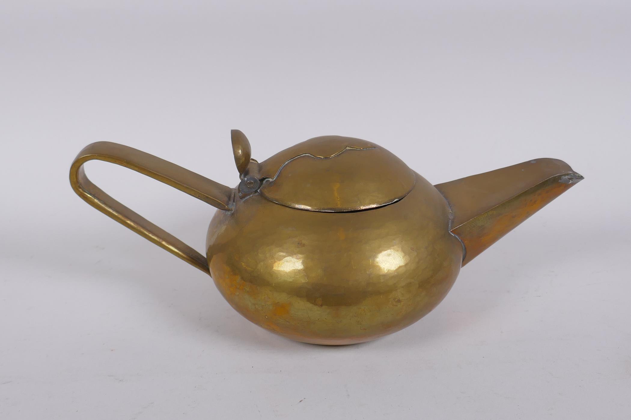 A quantity of Arts and Crafts metal wares including a copper kettle, brass teapot, hammered pewter - Image 3 of 6