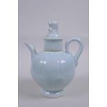A Chinese pale blue glazed porcelain teapot of lotus flower form, 16cm high