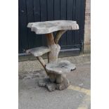 A root-wood two tier garden table, 85cm high