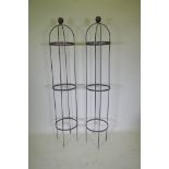 A pair of wrought iron plant obelisks, 190cm high