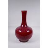 A Chinese flambe glazed porcelain bottle vase, 37cm high