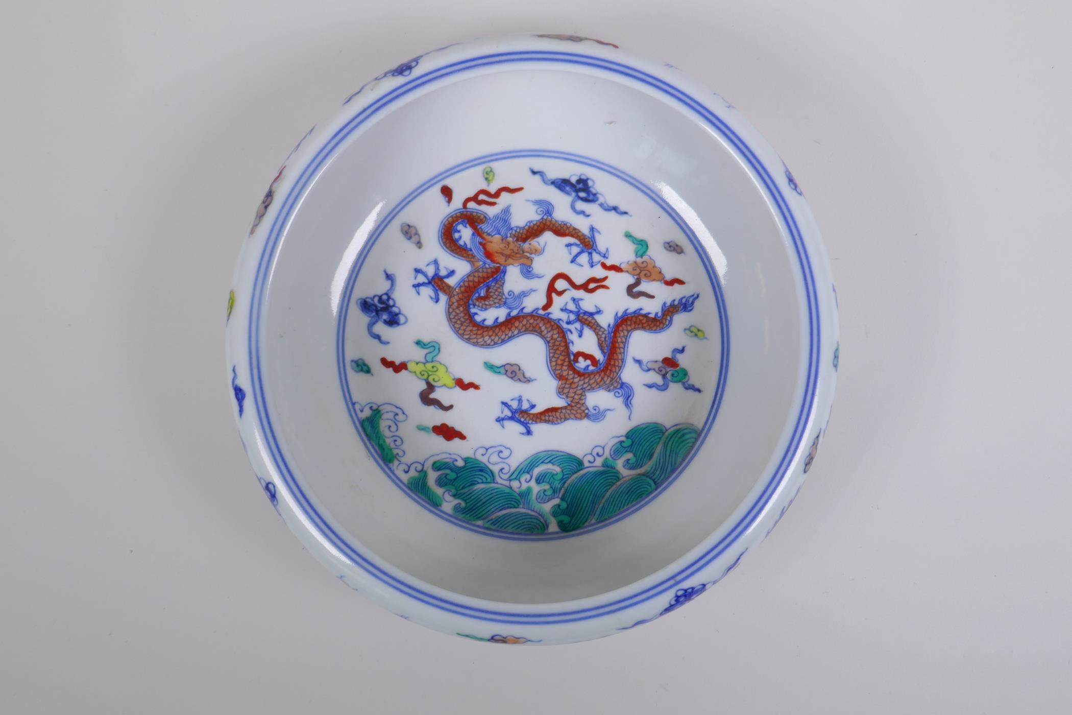A Chinese Doucai porcelain dish with rolled rim, decorated with dragons, Chenghua 6 character mark - Image 2 of 7