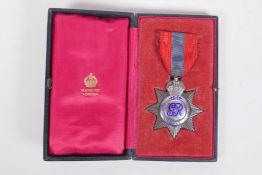 An Elkington silver plate and enamel Imperial Service Medal awarded to John Creasey, in its original