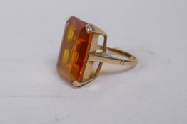 a vintage 9ct gold dress ring set with a large yellow topaz, size P, 11.6g gross