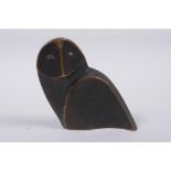 A stylised solid bronze owl sculpture, 10cm high
