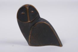 A stylised solid bronze owl sculpture, 10cm high