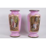 A pair of C19th continental pink ground vases with gilt highlights and decorated with tableaux