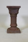 A cast iron pedestal in the form of a classical column, 25 x 25 x 50cm