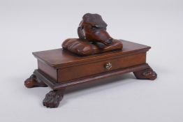 A C19th mahogany Black Forest needle box with a deer head mount and carved paw feet, 20 x 10cm