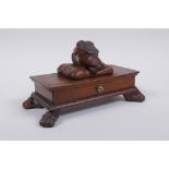 A C19th mahogany Black Forest needle box with a deer head mount and carved paw feet, 20 x 10cm