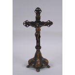 A cast bronze crucifix, 24cm high