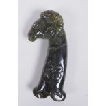 A Murghal style green hardstone dagger handle carved in the form of a ram's head, 14cm long, AF