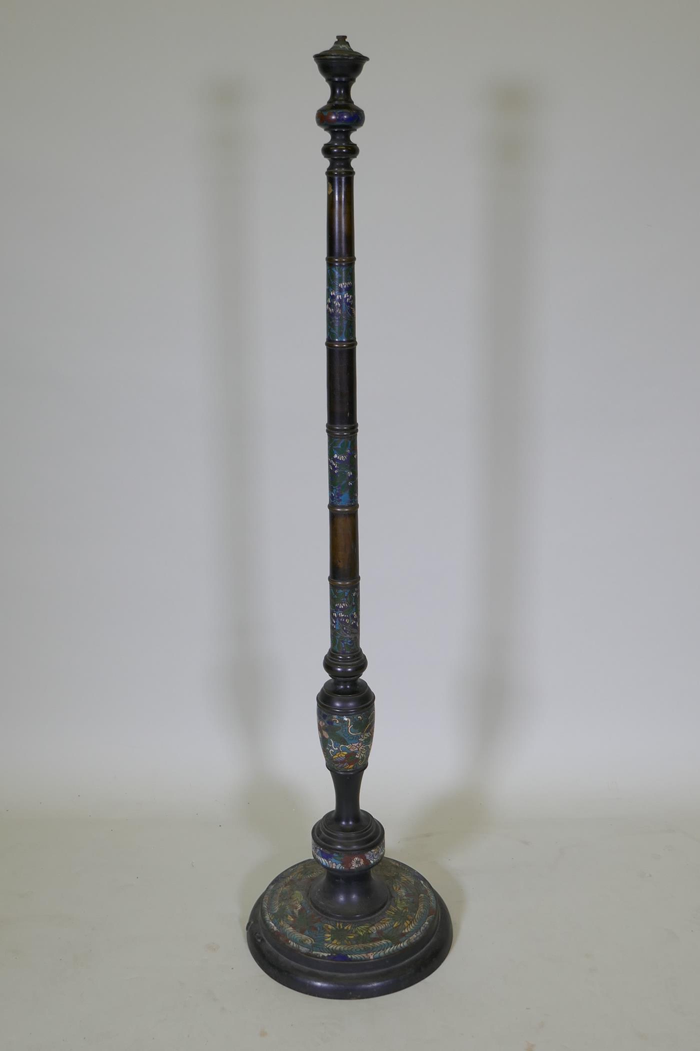 An oriental bronze and cloisonne floor lamp, 124cm high