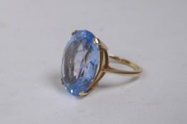 A vintage 9ct gold dress ring set with a large aquamarine, size M, 7.4g gross