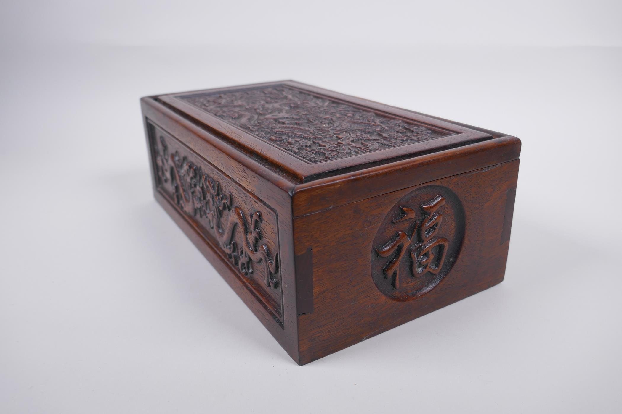 A Chinese carved hardwood box with dragon and character decoration, 28 x 16cm - Image 4 of 4
