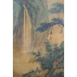 A C19th Chinese watercolour on cotton depicting a seated figure at the foot of a waterfall, signed