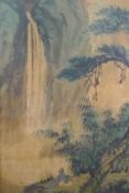 A C19th Chinese watercolour on cotton depicting a seated figure at the foot of a waterfall, signed